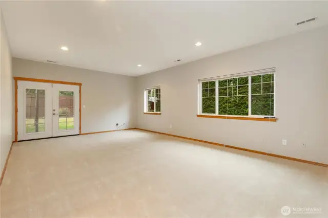 downstairs family room, french doors to backyard