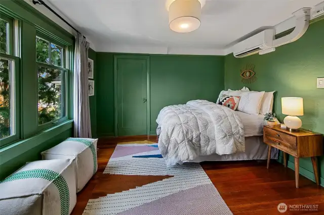 The 2nd upstairs bedroom has fir flors and views to the east.