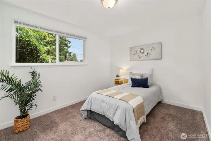 Second bedroom with a full closet and room for queen bed set or bunk beds!