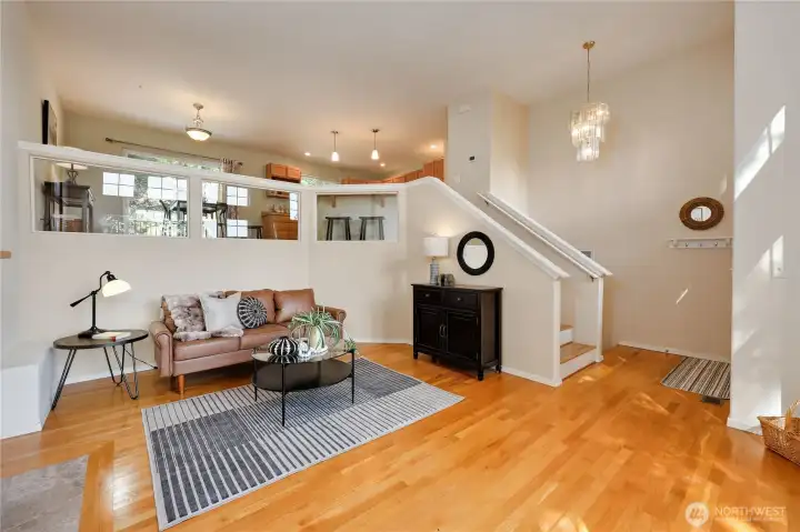view of the entry, living room, kitchen and dining room