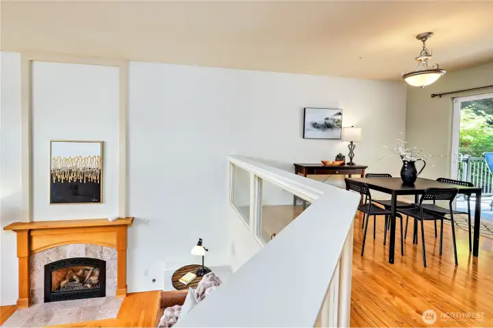 view from living room on the main level, to the dining room upstairs