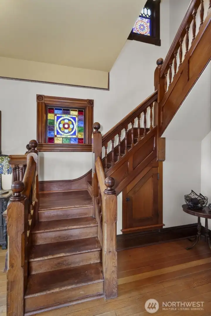 The millwork of the grand stairway isn't just a work of master craftsmanship, the age and condition of the wood, the stained glass, the detail seen in every corner of the home will likely keep you marveling at the expertise and care shown by the original builders in 1889.