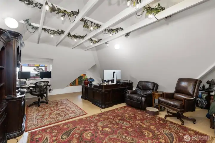 A 3rd view of the attic space. Fully finished, yet open to interpretation as to it's use.