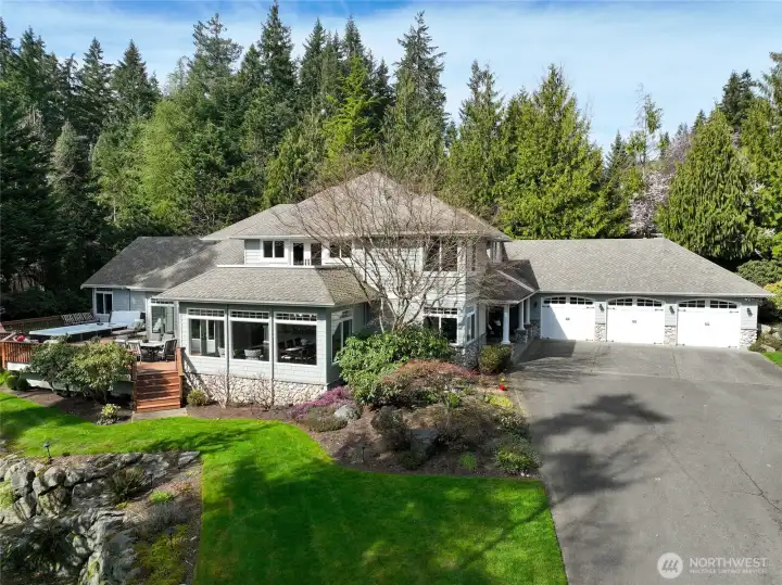 Enjoy peace & tranquility at your private sanctuary where this home lives like a Rambler!