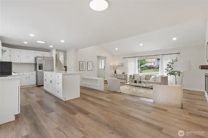 Open floor plan with living room open to dining area