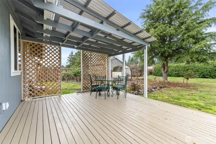 Large deck freshly painted with new covered area