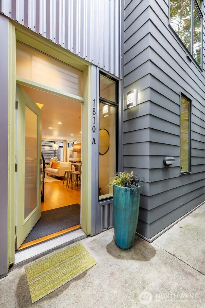 Welcome home to this custom townhome on the SE corner of '25 on the Park'