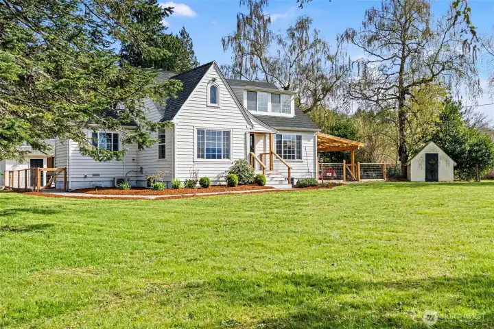 Large front yard W/ garden shed