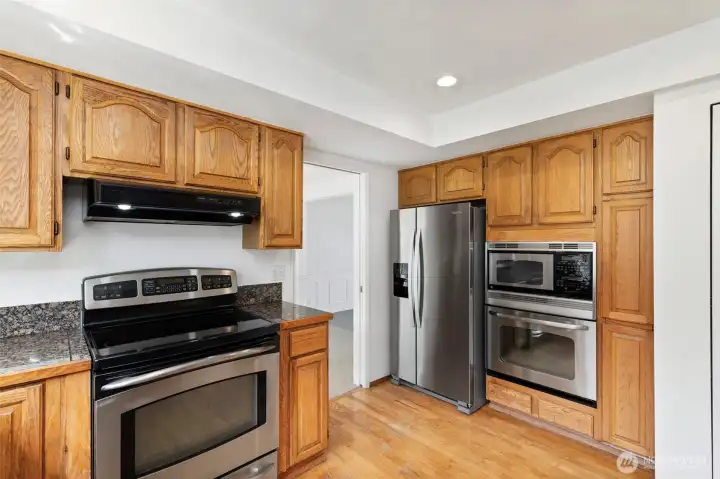 Kitchen. Doorway leads to formal dining room