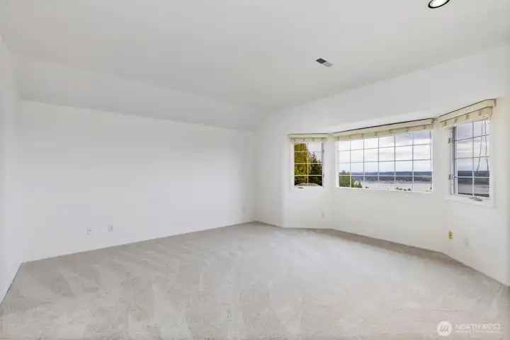 Primary suite. Linear closet on the wall out of frame to the right.