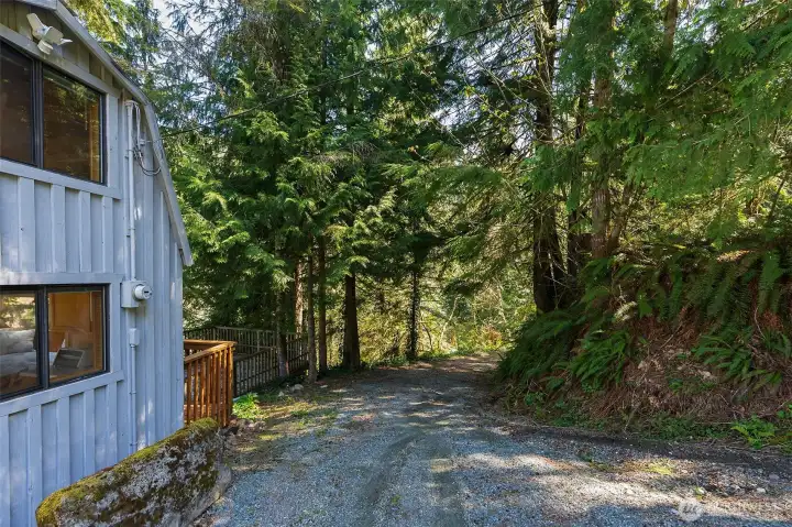 Toward the end of the deck may be a good spot to cut in steps to access the river, or reconfigure the deck with stairs.