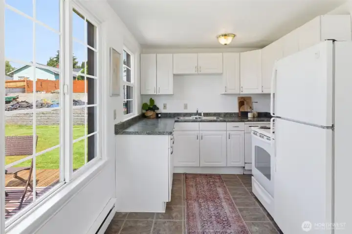 The kitchen has plenty of counters and storage. The kitchen has plenty of counters and storage.