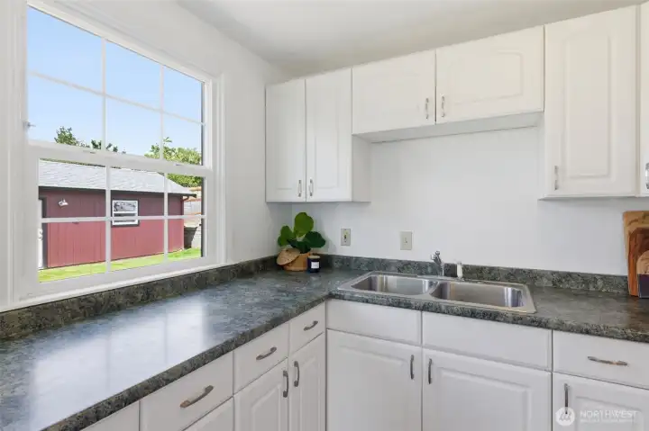 Kitchen looks out over back yard. Kitchen looks out over back yard.