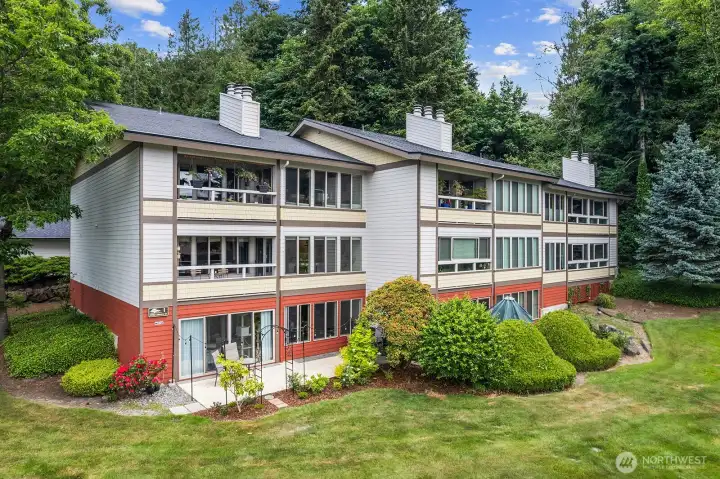 Welcome to Lake Ballinger Estates! Rare 2nd floor end unit with Level entry, open concept and zero stairs.This immaculate, level entry 2-bedroom condo offers a bright, light filled retreat with ultimate privacy along the back of the complex.