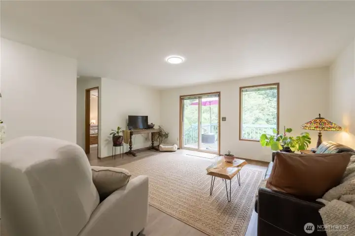 On the opposite side of the house, your primary suite... On the opposite side of the house, your primary suite...