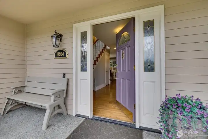Warm reception at the front door with a patio porch.