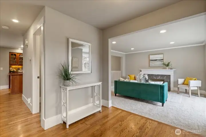 Entry foyer has real hardwood flooring that goes through to the kitchen.