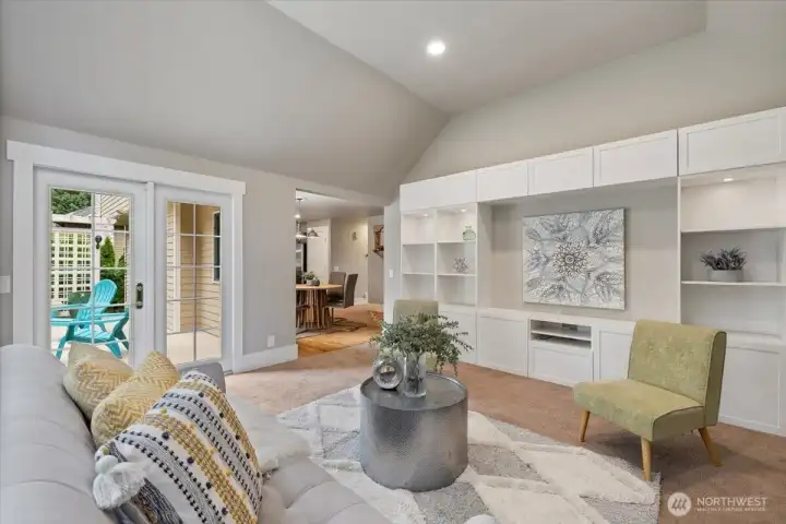 Entertainment shelving in the family room for all of your placement needs with TV and entertainment system. Books, and other items to accentuate.