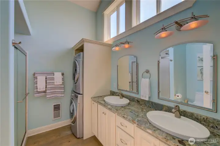 Primary bathroom with full size washer & dryer