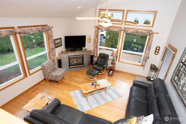 Side A- Comfortable living area enjoys gas fireplace & cathedral ceilings