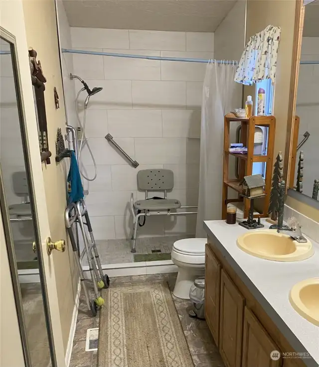 Primary Bedroom with new walk-in shower.