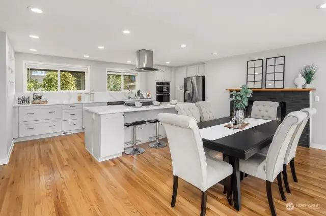 Open concept kitchen with large quartz island