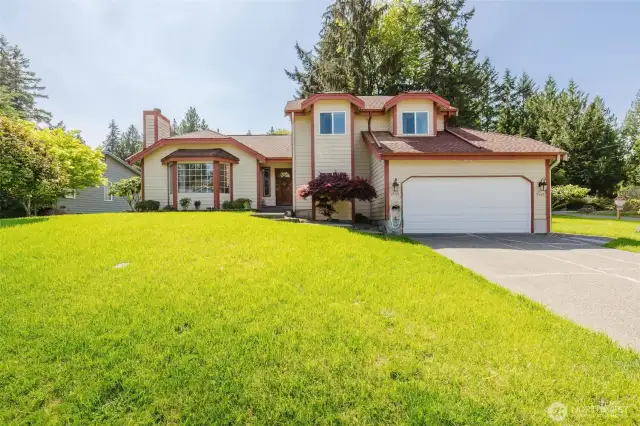 Fabulous Corner lot with the greenest grass you have ever seen!