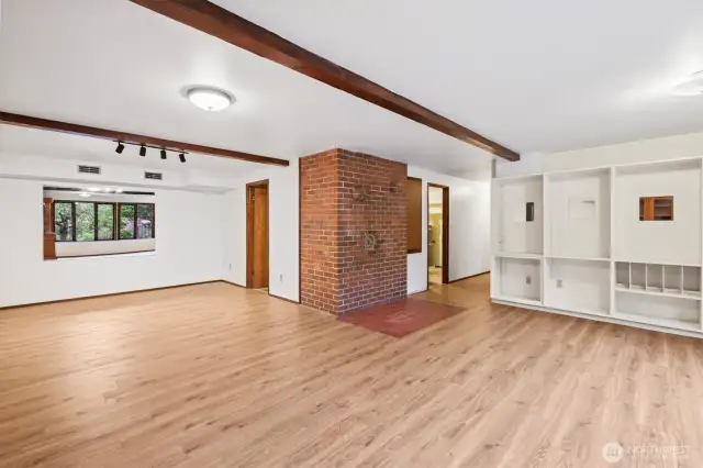 The downstairs living room provides all the space you need and has wonderful built-ins!
