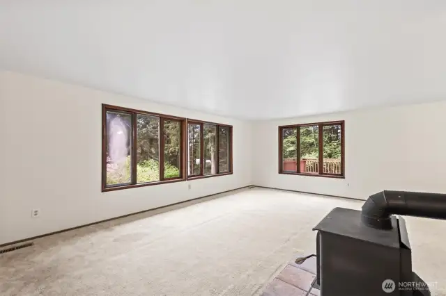 Huge upstairs living room with newer wood stove!