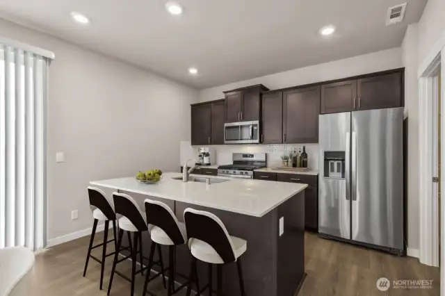 Photo is of a similar home. Colors and materials may vary.