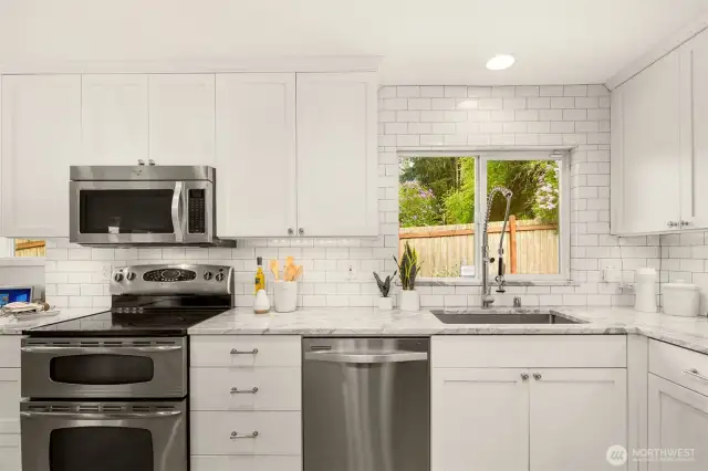 Full-height subway tile backsplash.