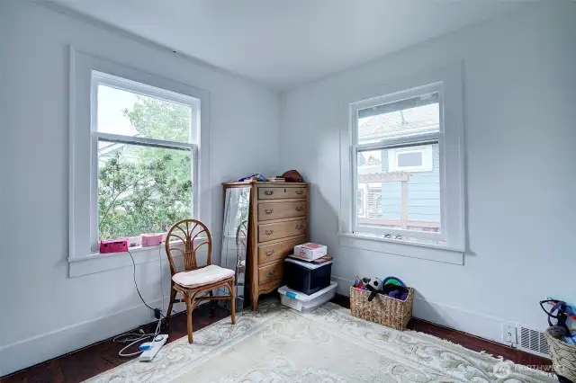 Second main floor bedroom at back of house.
