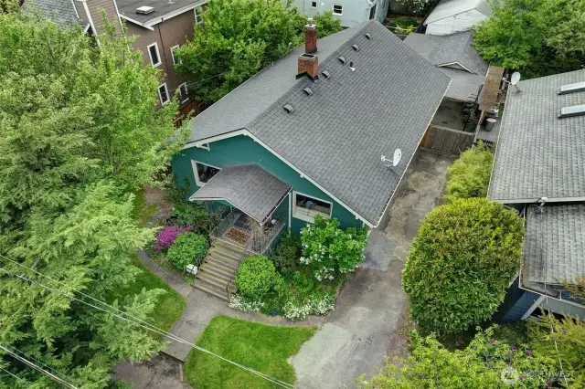 Driveway on north side of house has room for multiple vehicles.