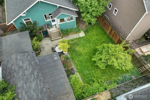 Back yard with garage/green house.