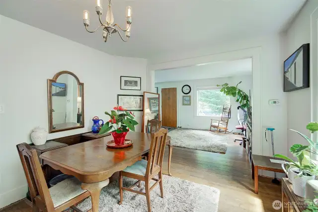 Dining room with original wood floors, new paint.