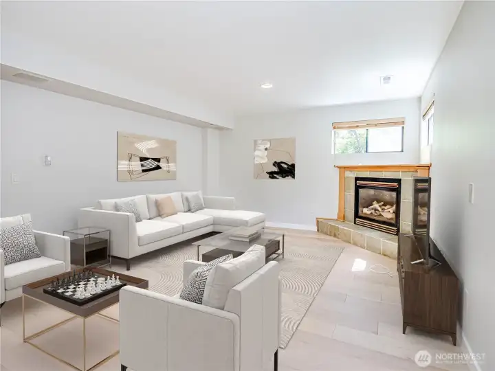 LOWER FLOOR REC ROOM LVP FLOORS GAS FIREPLACE