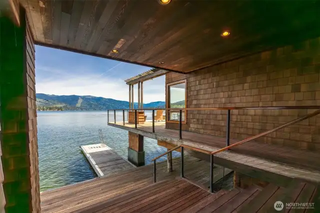 From the covered deck area one the lake level you can see the boat dock and there is abundant storage below the home, as well.