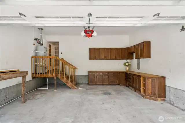 Attached Garage with Cabinet.