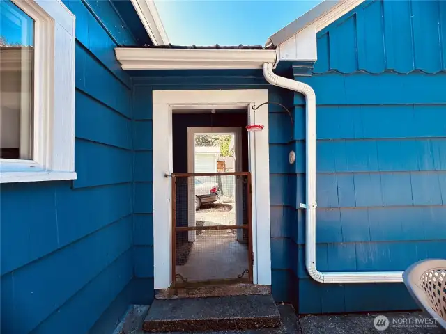 Breezeway between home and shop/garage & backyard.