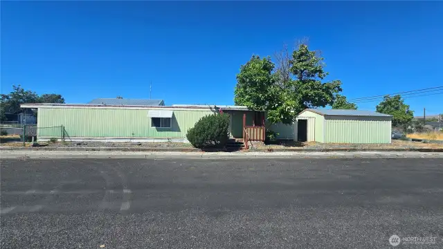 Spacious, rectangular, corner lot.