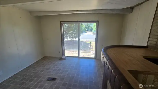 2nd living area with bar and sliding doors to exterior