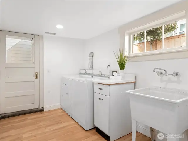 Shared Laundry space accessed through interior stairs
