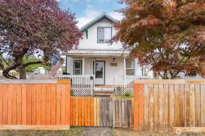 Front of house with fence