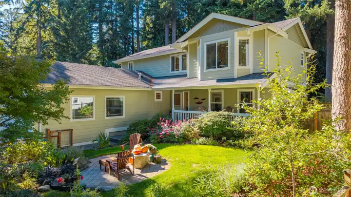 Relax on the patio overlooking the beautiful perennial garden. The front yard is fully fenced!