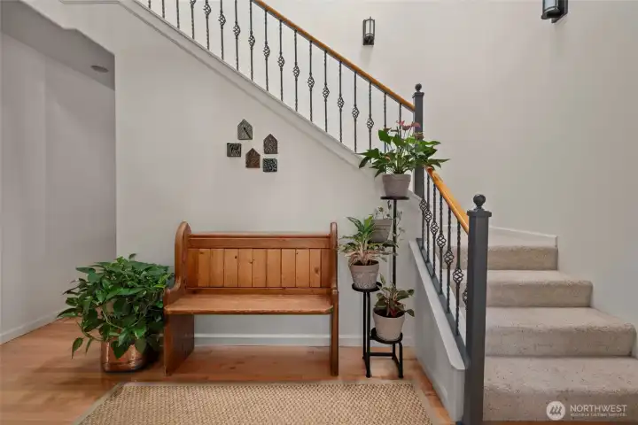 Maple hardwood floors extend through the entry, kitchen & dining room.
