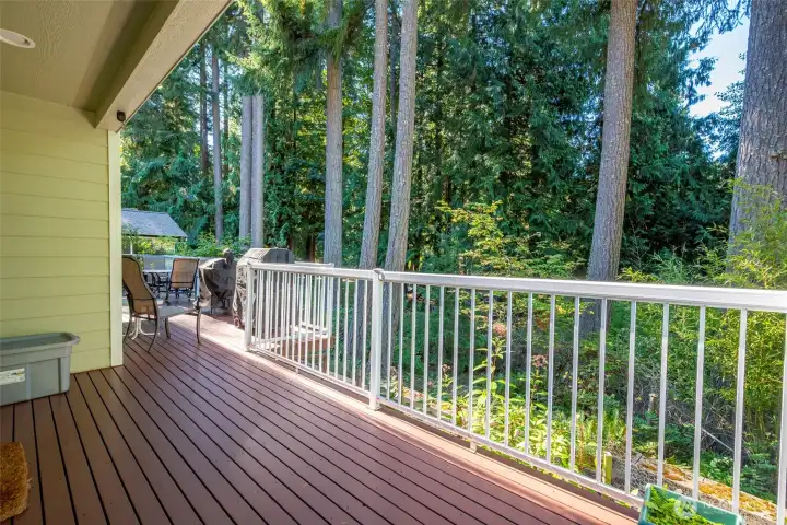Enjoy the private wooded views from the deck.