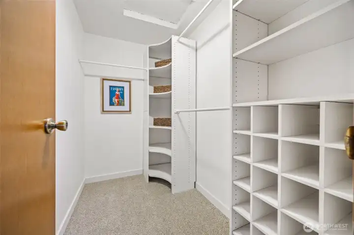 Primary bedroom has a huge walk-in closet.
