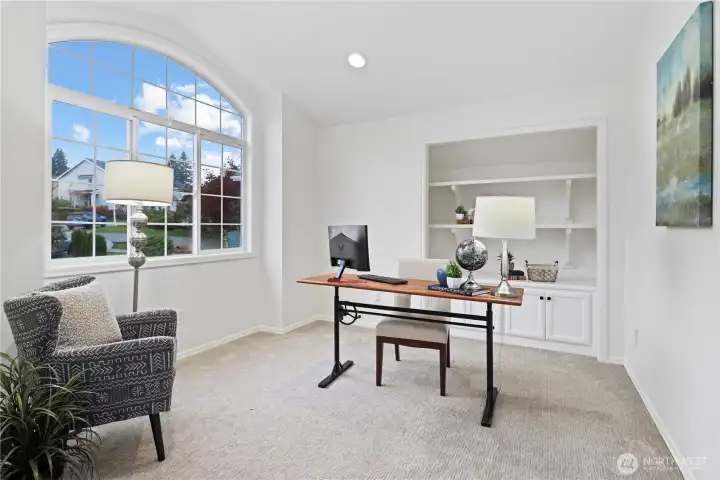 This den is just up the stairs off the front door - built in shelves!