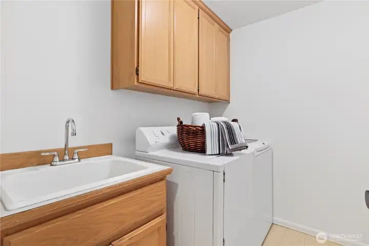 Back downstairs, the laundry is by the kitchen