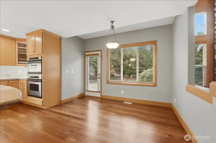 Casual dining in the kitchen with access to the backyard.